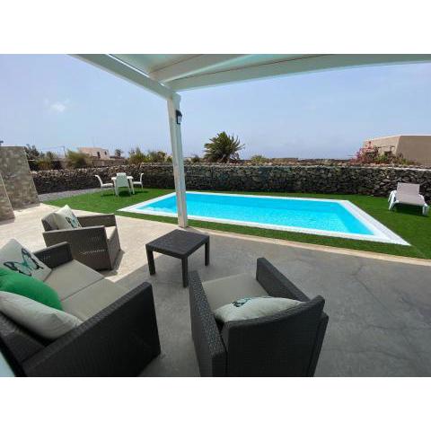 2 bedrooms villa with sea view private pool and enclosed garden at El Roque El Cotillo 1 km away from the beach