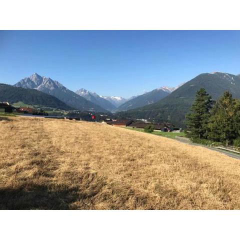 Apartment Wiesenhof - NATUR & WEITBLICK über Innsbruck - Ladestation für Elektroautos