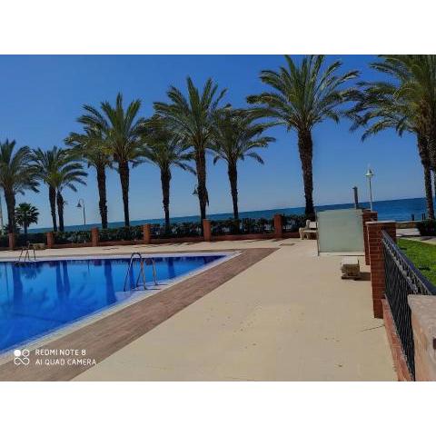 BEACHFRONT APARTMENT in Algarrobo Costa (La Axarquía), next to Torre del Mar