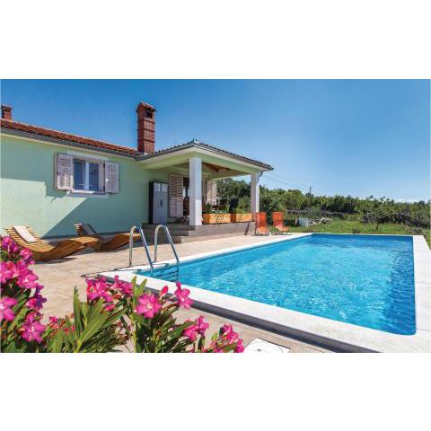 Beautiful home in Koromacno with 2 Bedrooms, WiFi and Outdoor swimming pool