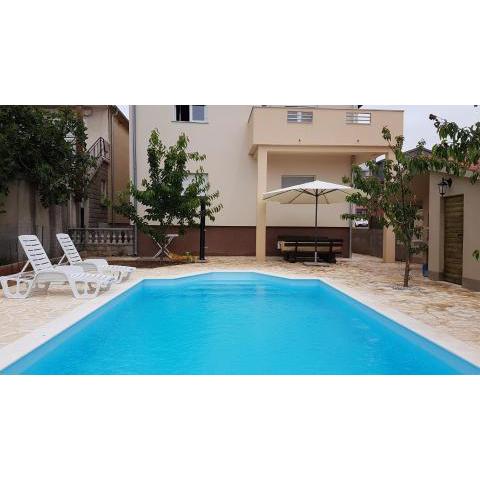 Family friendly apartments with a swimming pool Zadar - 14933