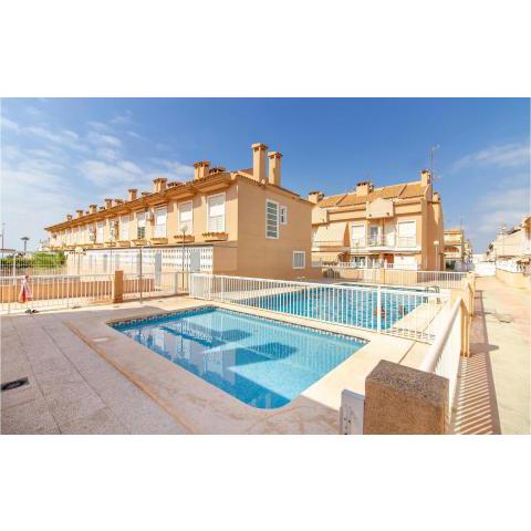 Nice home in Santa Pola with Outdoor swimming pool, WiFi and 2 Bedrooms