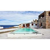 Stone villa with a sea water swimming pool and a sea and sunset view